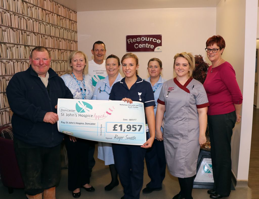 Roger Smith is pictured far left together with staff from St John’s Hospice and from the hospice appeal.