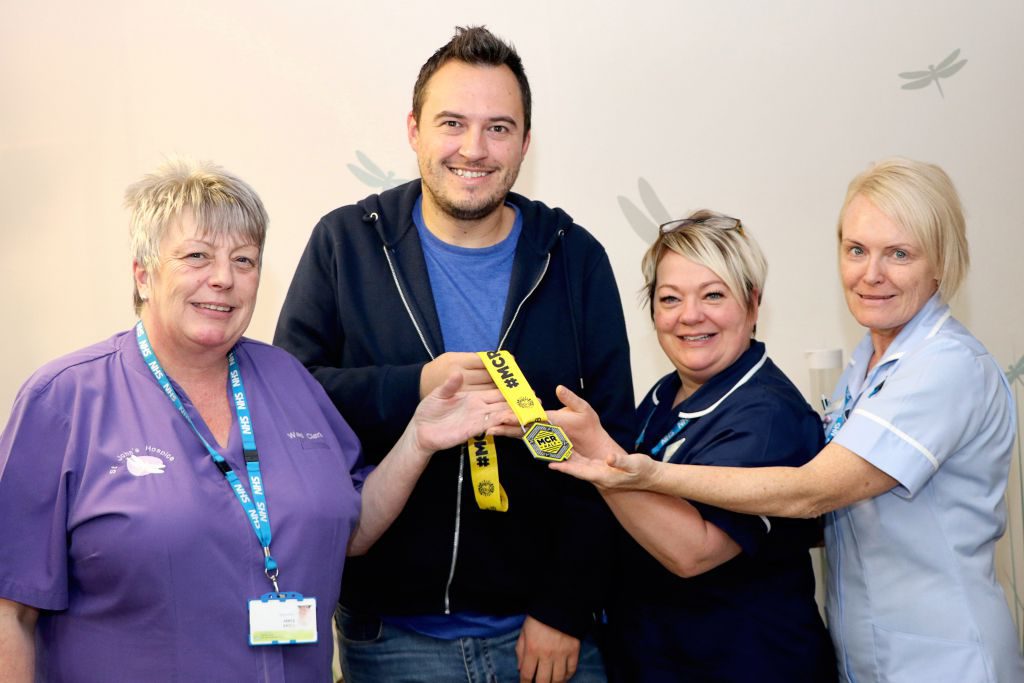 Matt is pictured with hospice staff