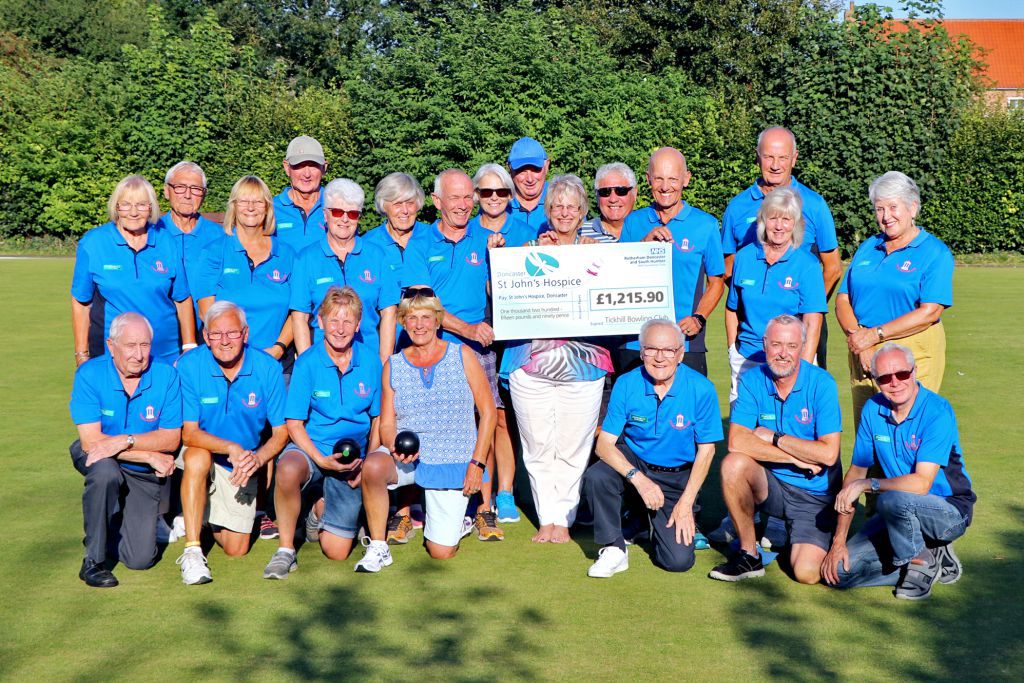 Maureen Harwood, of St John’s Hospice, is pictured (middle row, 5th from the left), with Les Crownshaw (middle row, 6th from left) surrounded by members of Tickhill Bowling Club.