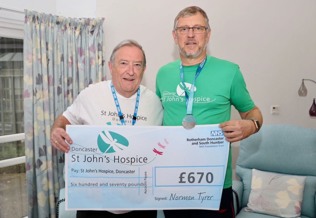 Pictured is Norman Tyrer with John Wells of the Hospice