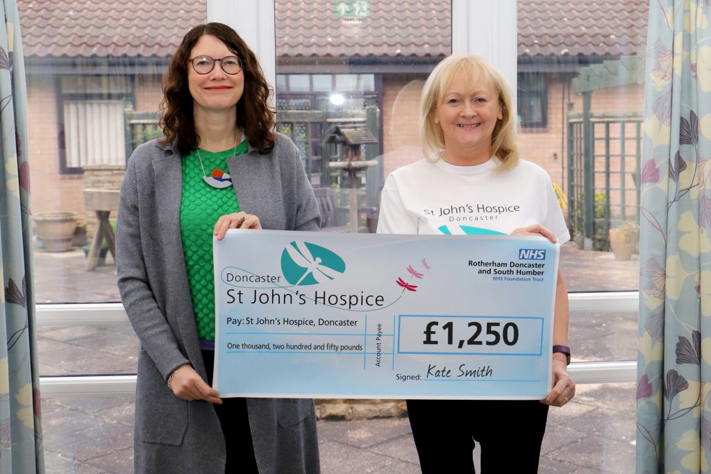Kate (left) is pictured with Lindsey Richards of the hospice (right).